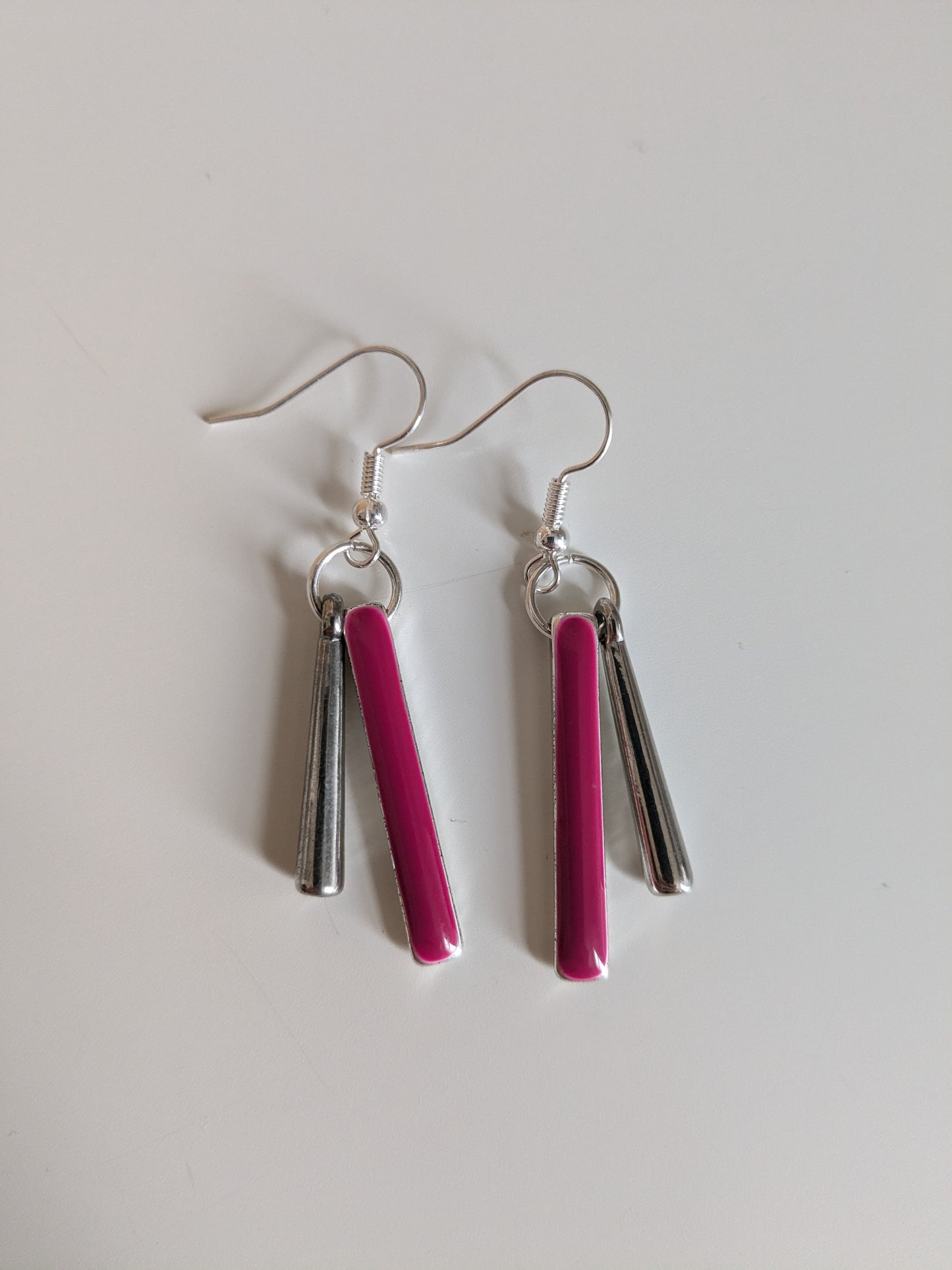 Dangle earrings made from two pink and silver tone vintage metal bars, and new silver-plated wires.